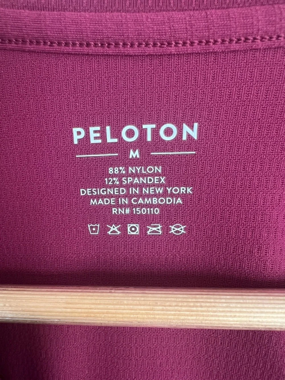 Peloton Maroon Short Sleeve Dry Fit Tee with Orange Logo-Size Medium - Picture 4 of 7